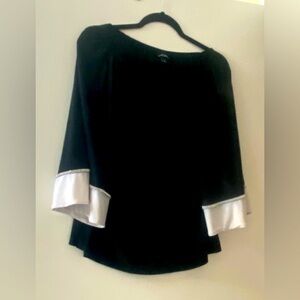 Womens black and white rhinestone blouse.
